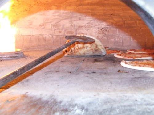 Bruciatore per fonro pizzeria a pellets in funzione